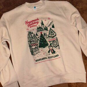 Cream Hogsmeade Holiday Market sweatshirt
